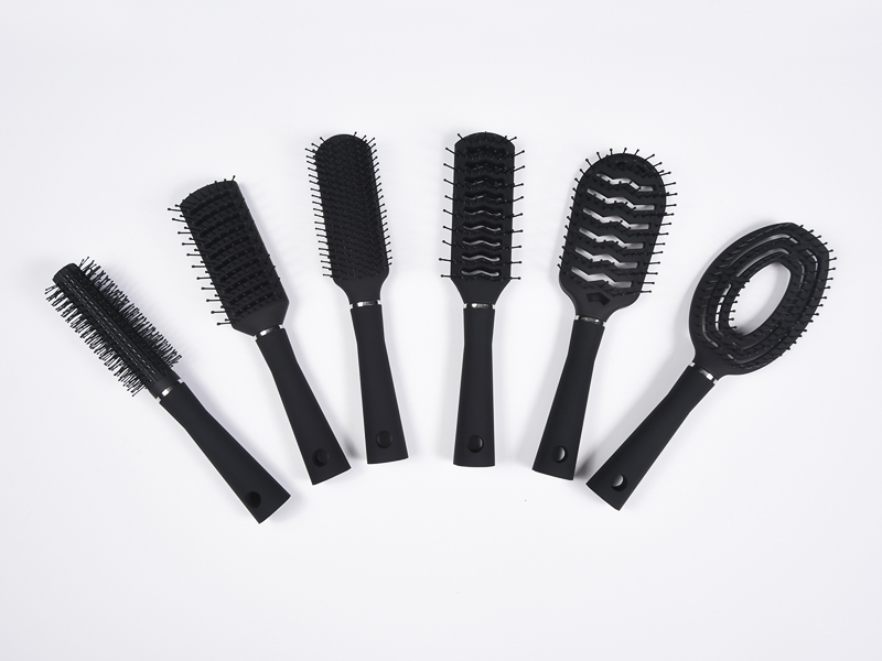 Escova de cabelo para ventilação com almofada de revestimento de borracha