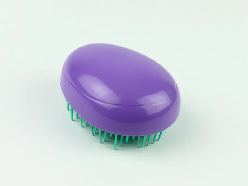 Mini escova de cabelo infantil em formato de ovo
