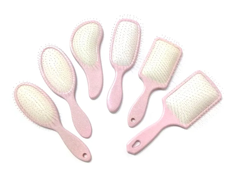 Escova de cabelo de plástico rosa extravagante