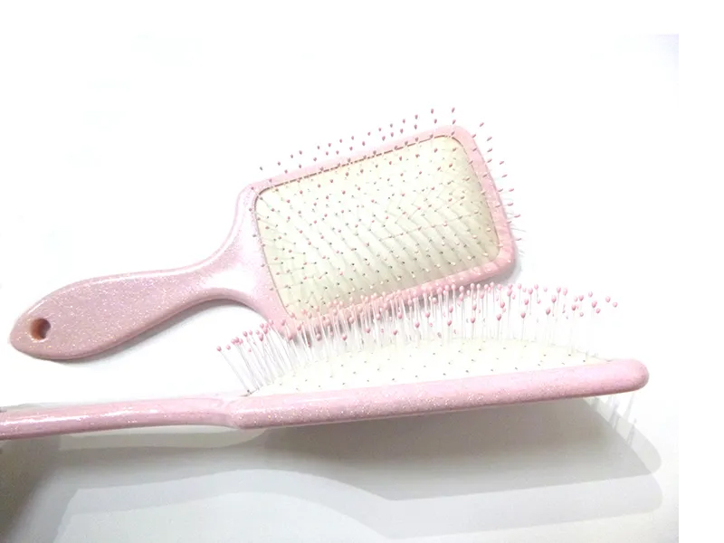 Escova de cabelo de plástico rosa extravagante
