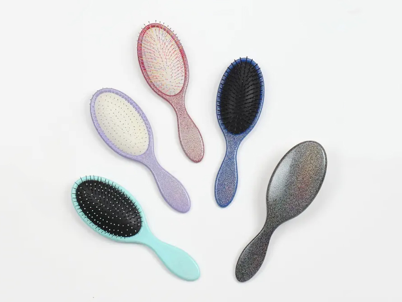 Escova de cabelo com almofada para desembaraçar de plástico com cerdas