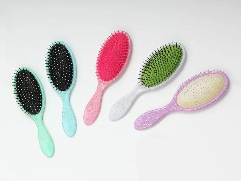 Escova de cabelo com almofada para desembaraçar de plástico com cerdas