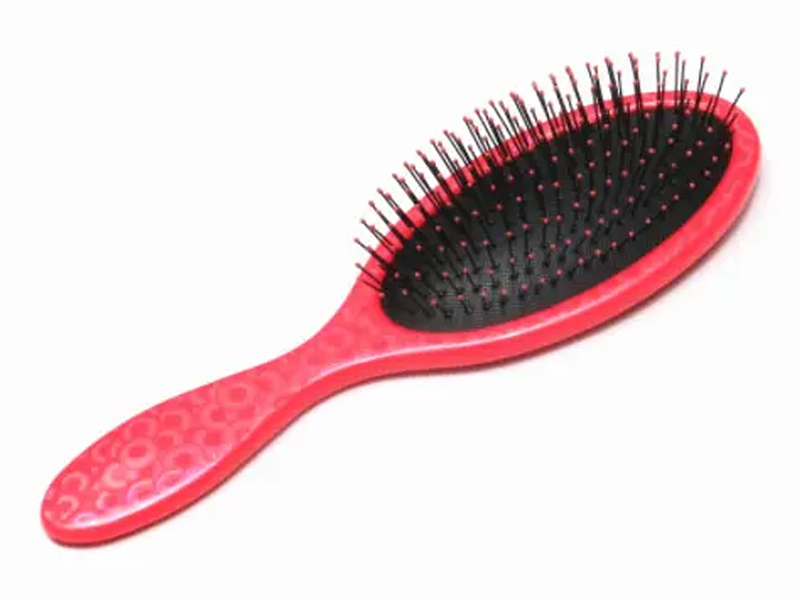 Escova de desembaraçar oval brilhante com estampa extravagante